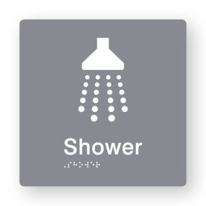 Shower Braille Sign in Grey Tactile printed Acrylic. Grey Sign panel with white Shower Symbols. White Text reads Shower. White Braille Text is shown