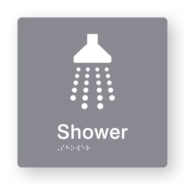 Shower Braille Sign in Grey Tactile printed Acrylic Shower Braille Sign in Grey Tactile printed Acrylic. Grey Sign panel with white Shower Symbols. White Text reads Shower. White Braille Text is shown