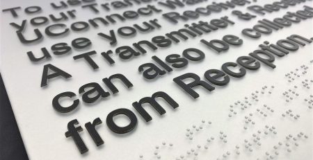Moulded Silver Acrylic Braille Sign - Close up