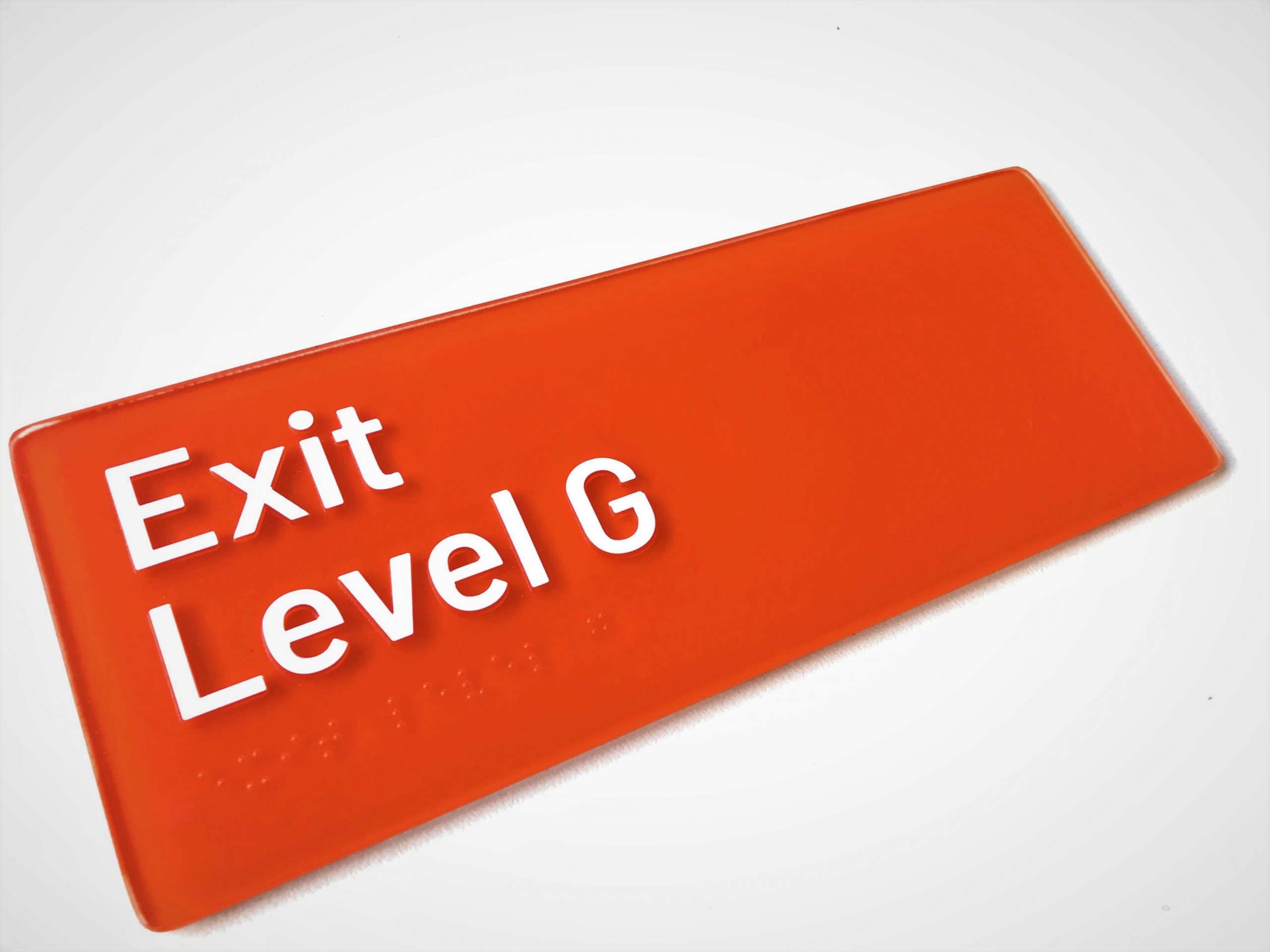 Orange Exit Level Braille Sign